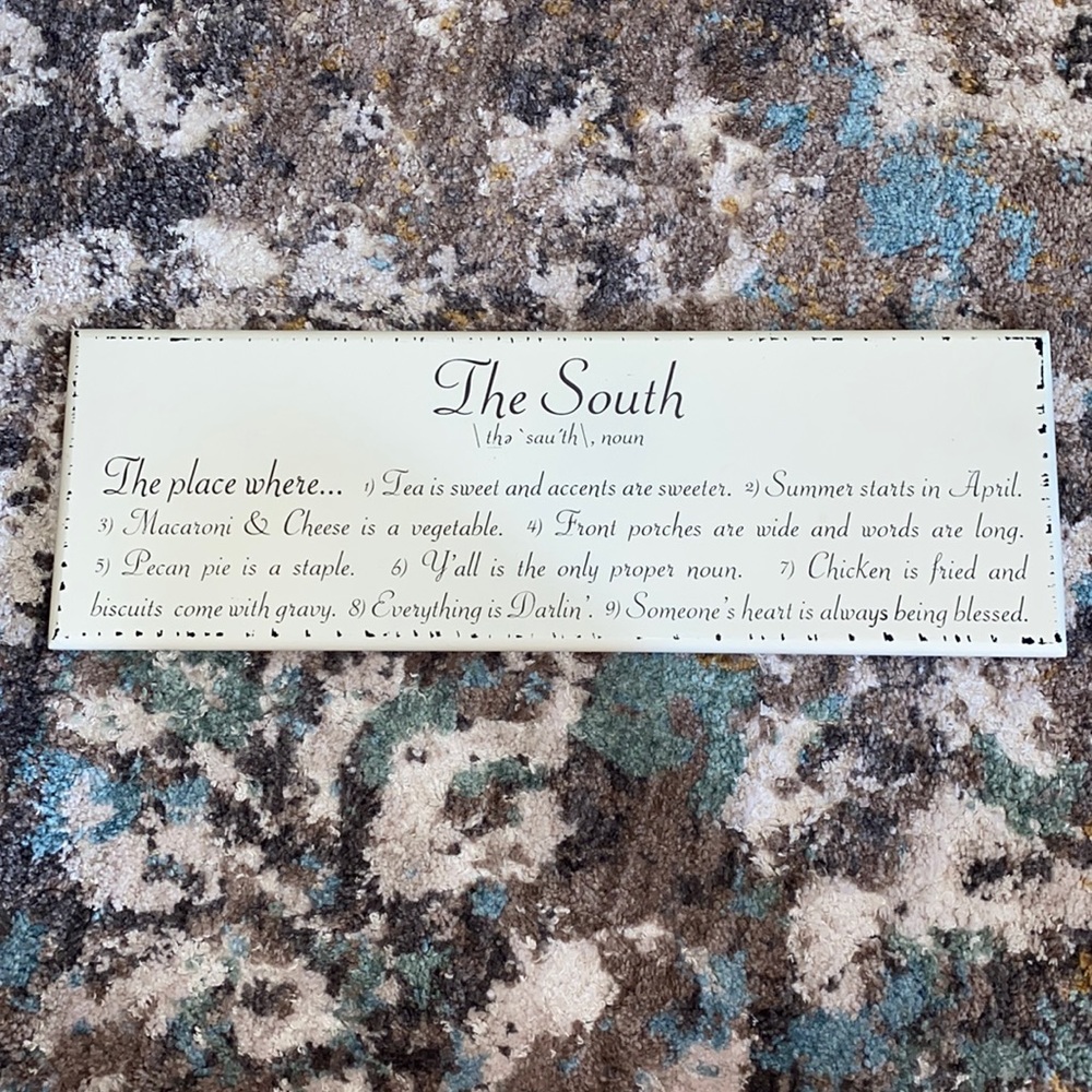 The South decorative hanging sign